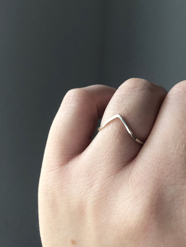 Celine-v-shaped-silver-ring-in-recycled-silver-by-eco-jeweller-Marie-B-Gade-on-hand