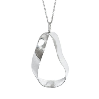 A silver statement pendant necklace with a scandinavian, organic, sculptrural wavy open teardrop shape on a delicate chain, shown against a plain white background.