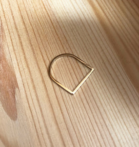 Alaska-u-shaped-9K-gold-ring-in-recycled-9K-gold-by-Marie-Beatrice-Gade-flat-lay-wood