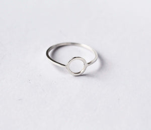 Continuum-ring-by-Marie-Beatrice-Gade-made-from-recycled-925-silver-on-a-flatlay