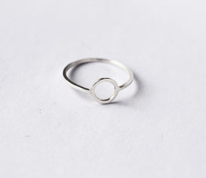 Continuum-ring-by-Marie-Beatrice-Gade-made-from-recycled-925-silver-on-a-flatlay