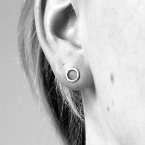 Continuum-silver-circle-stud-earrings-by-Marie-BeatriceGade-on-model