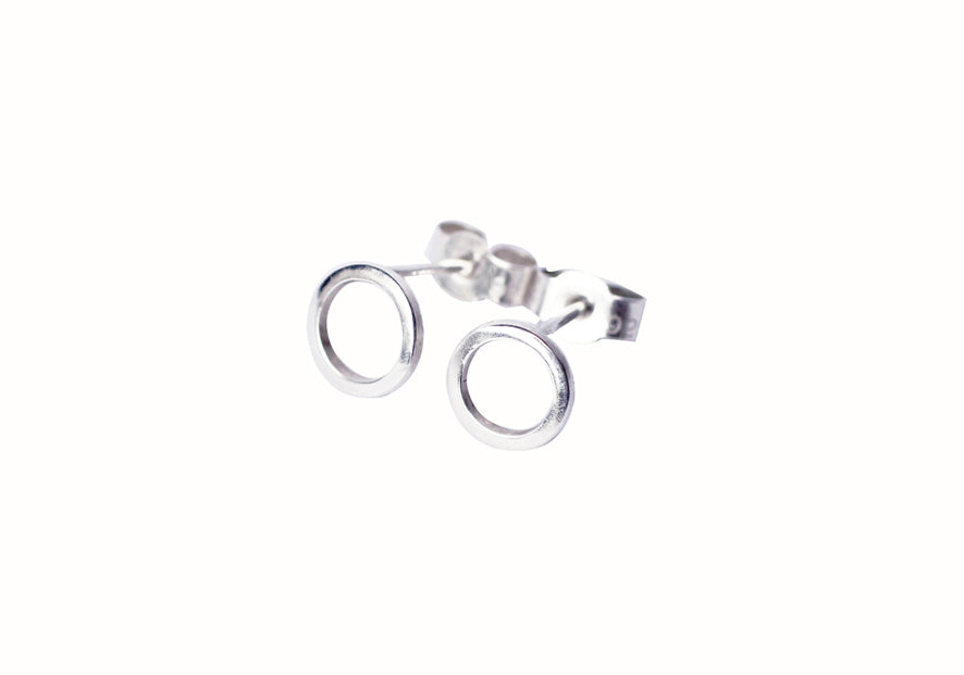 Continuum-silver-circle-stud-earrings-on-white-background