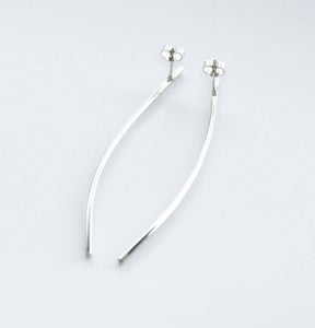 Curve-long-thin-earrings-by-Marie-Beatrice-Gade-on-white-background