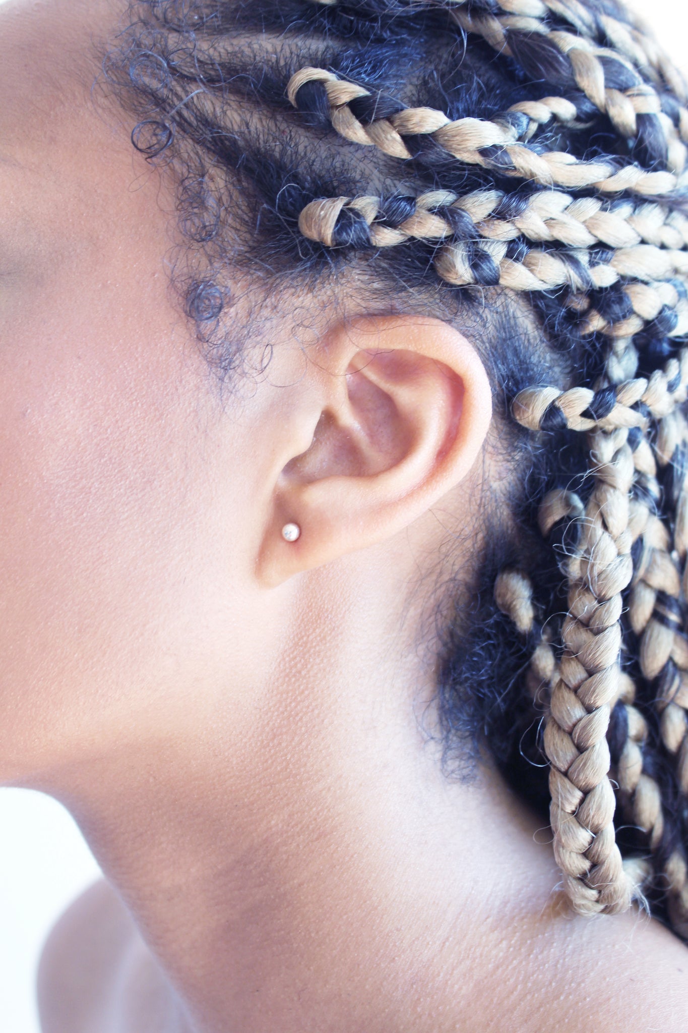 Dew-drop-silver-bead-stud-earrings-on-model