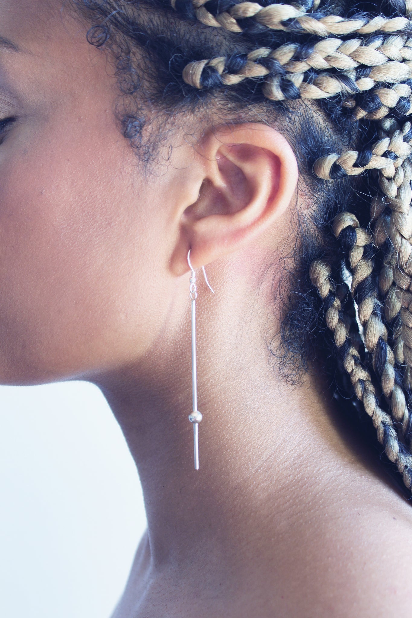 Dew-silver-bead-stem-earrings-on-model-by-Marie-Beatrice-Gade