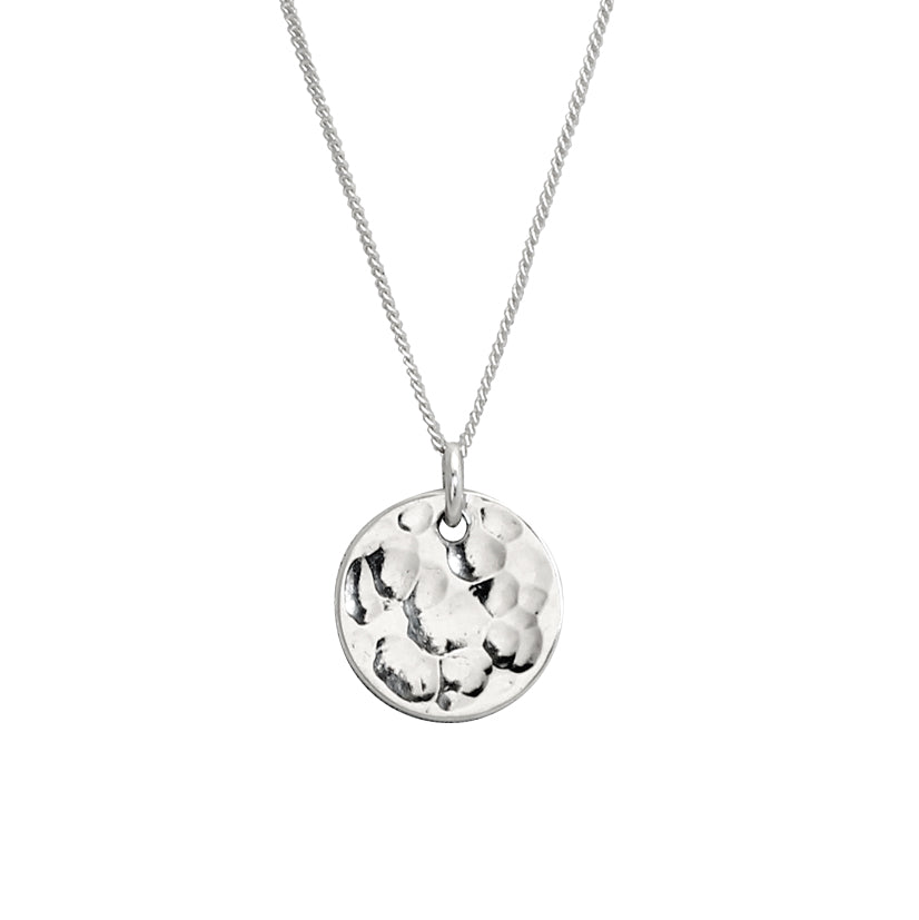 Dominga-hammered-silver-pendant-necklace-flatlay-MBG-whitebox
