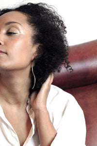 Faye-long-silver-earrings-by-Marie-Beatrice-Gade-on-model