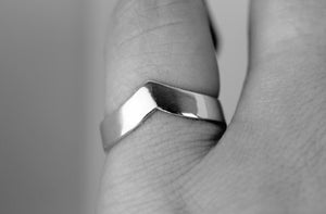 Recycled-sterling-silver-925-Adelphi-v-shaped-silver-ring-worn-on-hand-by-Marie-Beatrice-Gade
