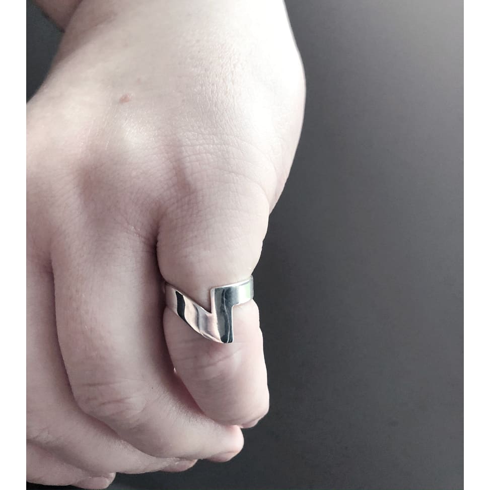 ELAIA-unisex-organic-shaped-silver-ring-on-hand-by-Marie-Beatrice-Gade