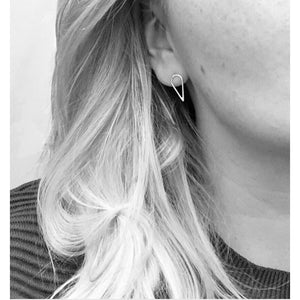 Filippa Arrow earrings by M of Copenhagen on model