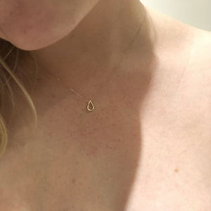 Modern heirloom Filippa 9 ct yellow gold necklace by Marie Beatrice Gade shown on model