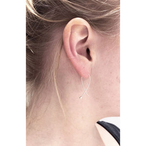 Gabrielle earrings in silver by Eco jeweller M of Copenhagen on model