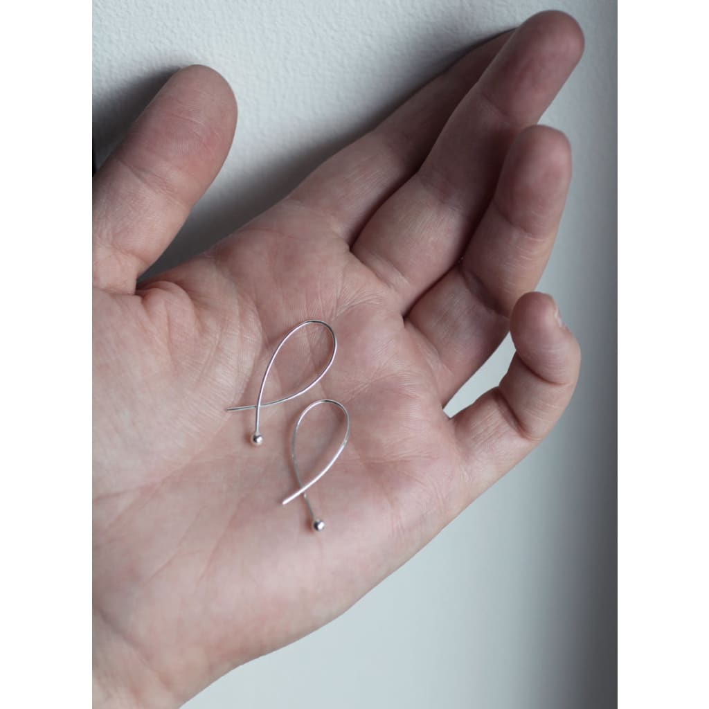 Gabrielle earrings in silver by Eco jeweller M of Copenhagen in hand