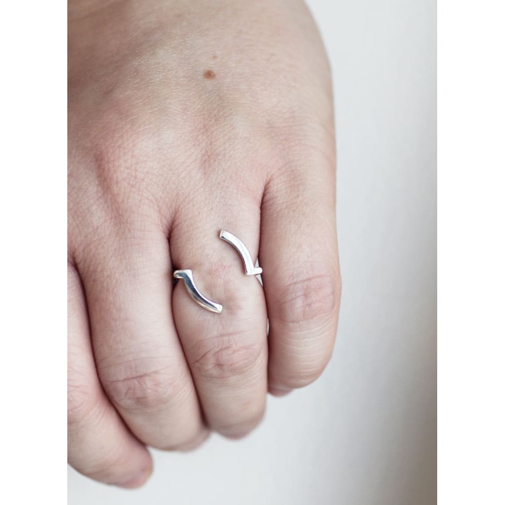 Gefion silver ring by M of Copenhagen made from recycled silver shown on models hand