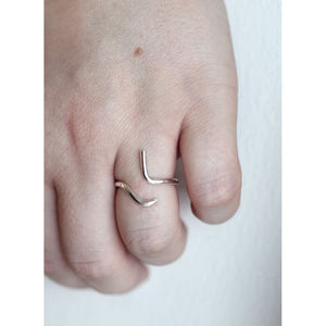 One size fits all Hera ring made from recycled silver by M of Copenhagen on models hand