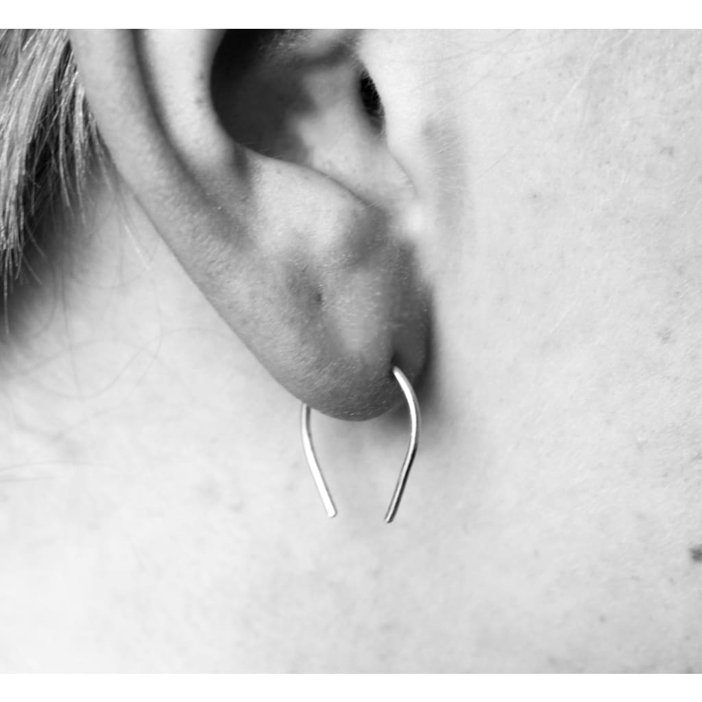 Hook recycled sterling silver earrings by M of Copenhagen shown on model from side