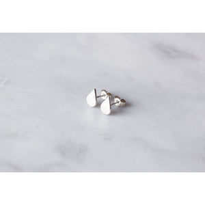 Laguna earrings by M of Copenhagen shown on marble surface