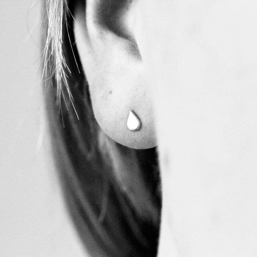 Laguna mini earrings by M of Copenhagen showcased on model