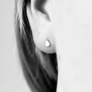 Laguna mini earrings by M of Copenhagen showcased on model