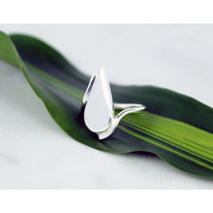 Laguna ring by M of Copenhagen shown from the side posed on leaf