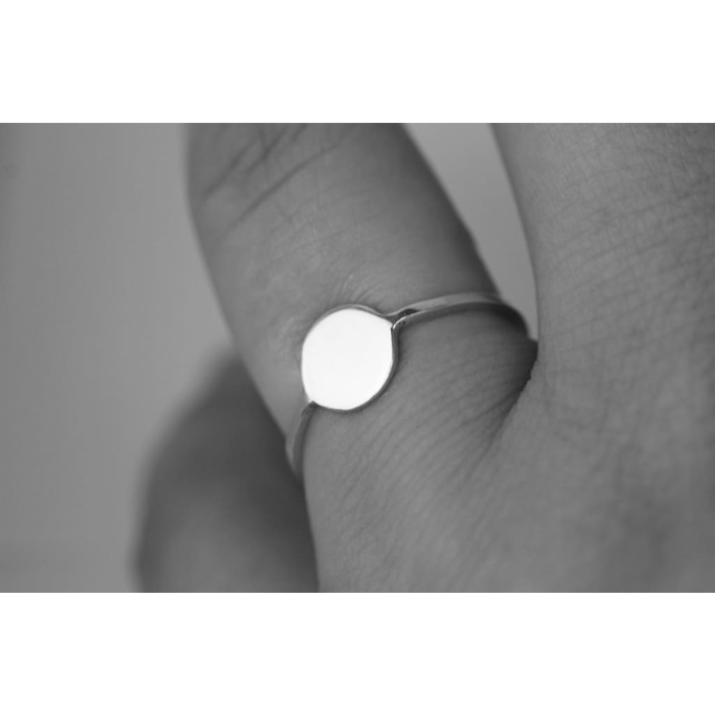 Moon ring by M of Copenhagen from recycled silver shown on hand