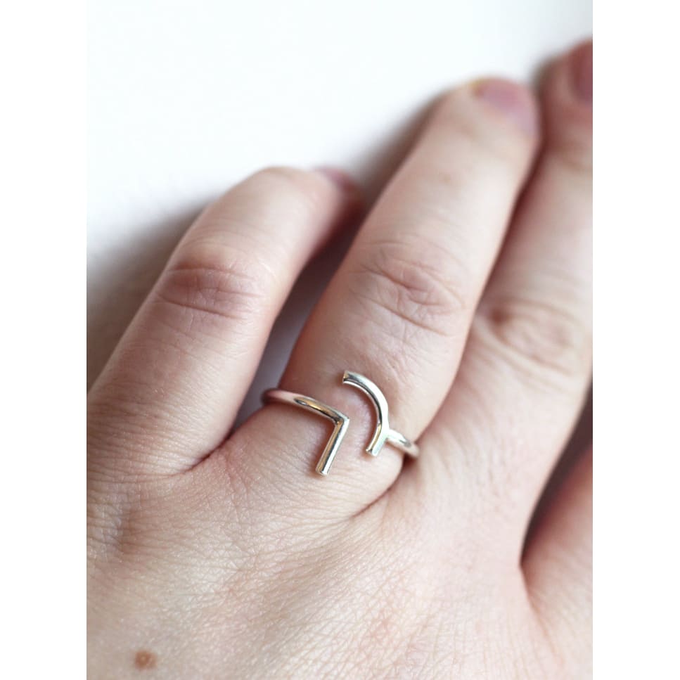 Naxos silver ring in recycled silver by M of Copenhagen on models hand