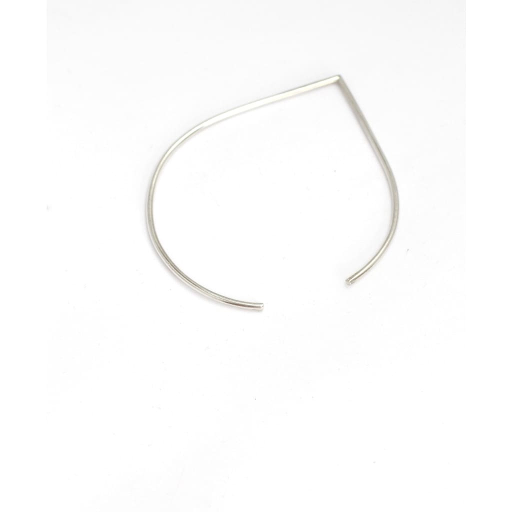 Portofino bangle by M of Copenhagen made with recycled silver on white background
