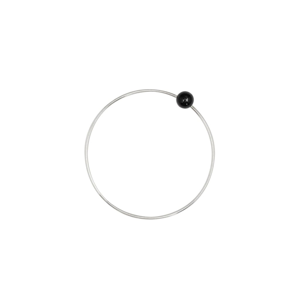 Positano bangle by M of Copenhagen made with recycled silver and a natural obsidian bead