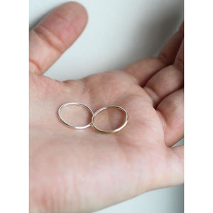 Stacking rings in gold and silver by M of Copenhagen