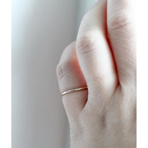 Stella stacking ring in silver by M of Copenhagen on models hand