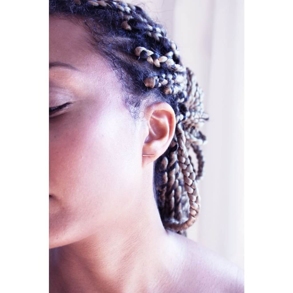 Tundra 9ct red gold earrings by M of Copenhagen shown on model