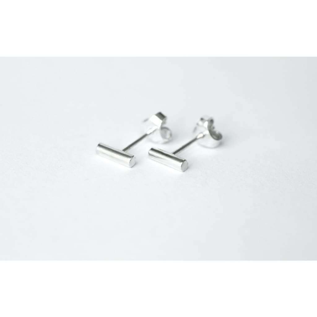 Twig earrings by M of Copenhagen made with recycled silver shown on model