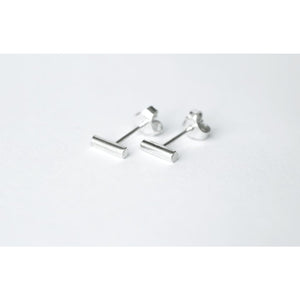 Twig earrings by M of Copenhagen made with recycled silver shown on model